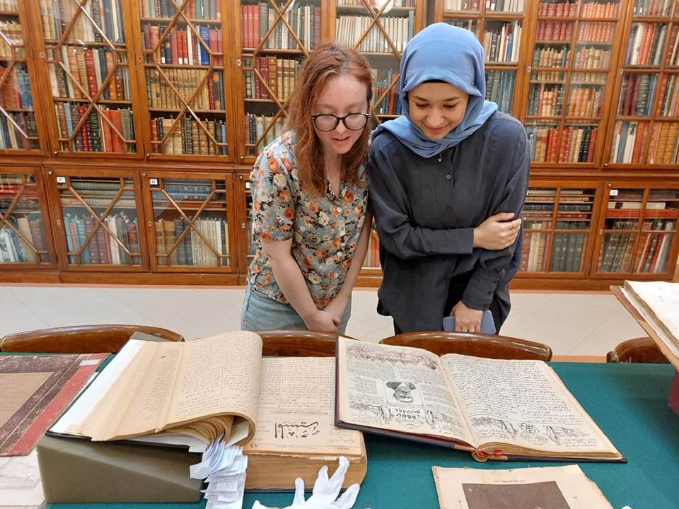 students exploring books at the rare book and special collections library
