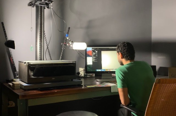 Boy sitting on a computer